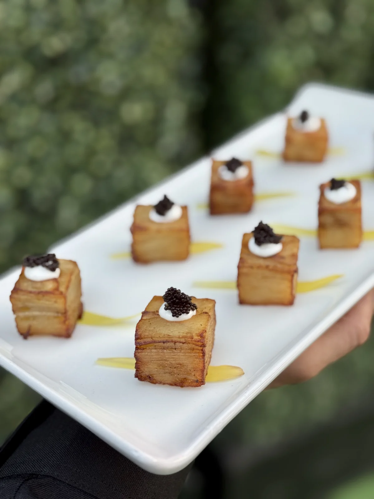 Signature Mille-Feuille Potato with caviar served at a downtown San Jose executive conference catered by Handheld Catering